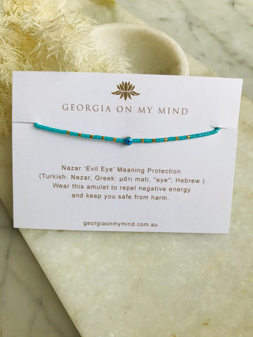 Gold Bead Evil Eye String Bracelet